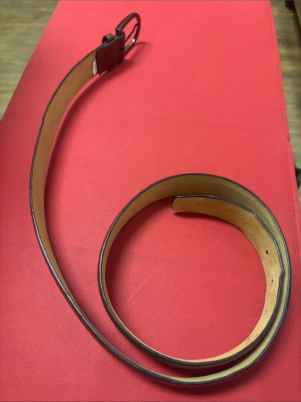 Kenneth Cole brown coated leather Belt with Embossed Logo